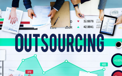 A M Global tax professionals providing Outsourced Tax Services using dual monitors and Lacerte software.